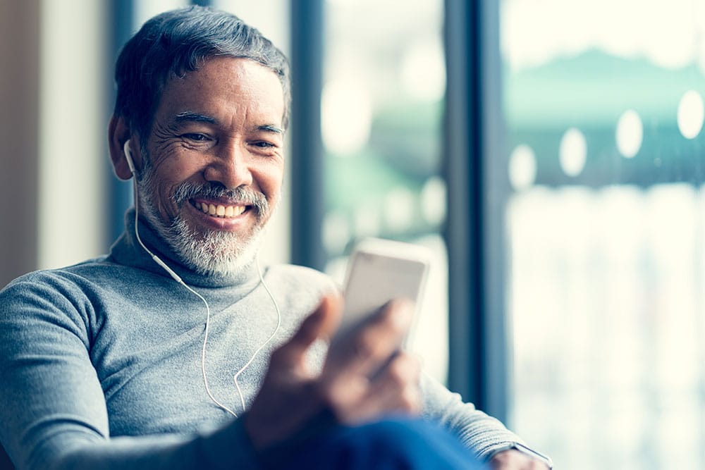 Man listening to audio to help reduce anxiety