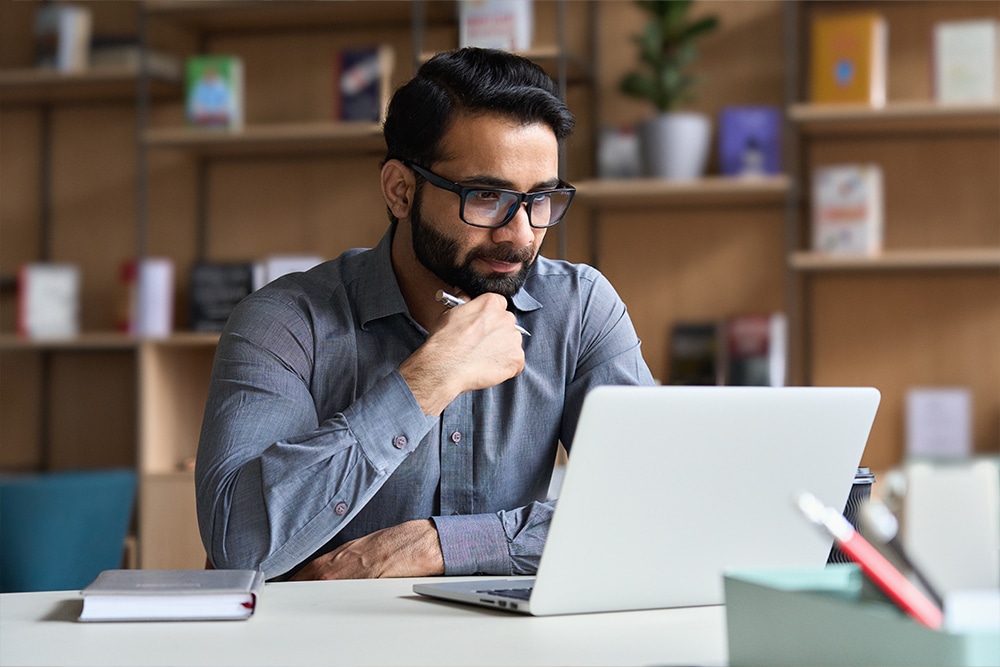 Person on laptop watching wellbeing webinar