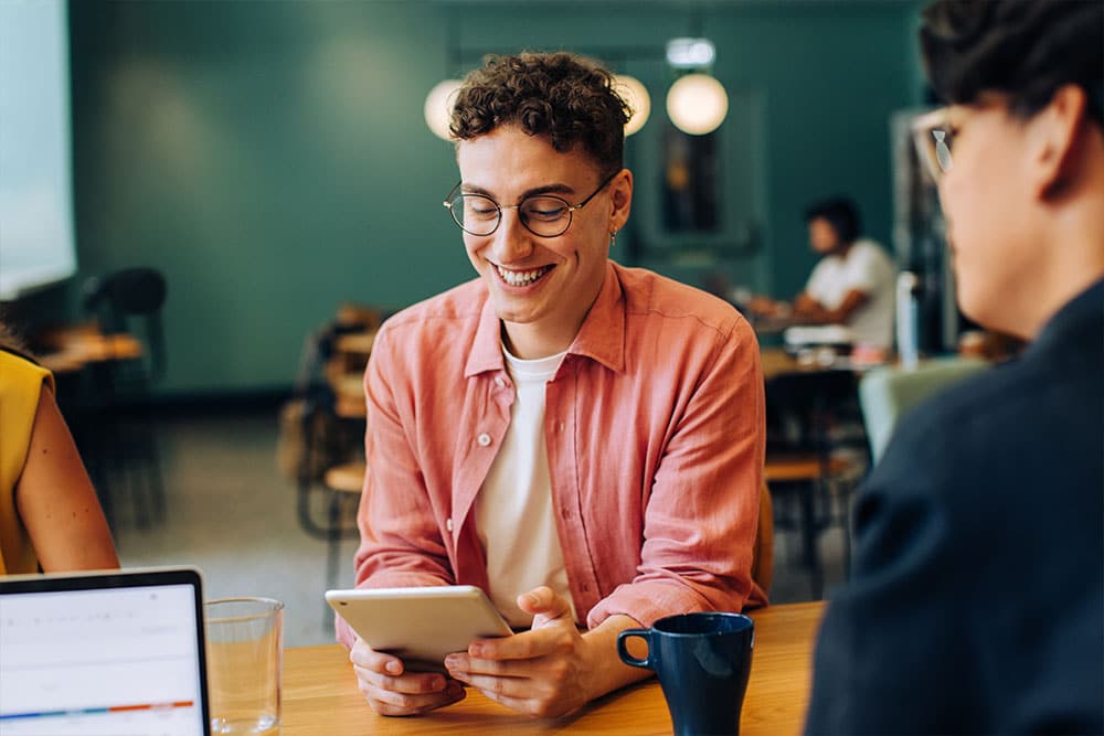 Person using positive mindset to work through task at work